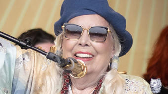 Joni Mitchell makes triumphant surprise return to Newport Folk Festival 