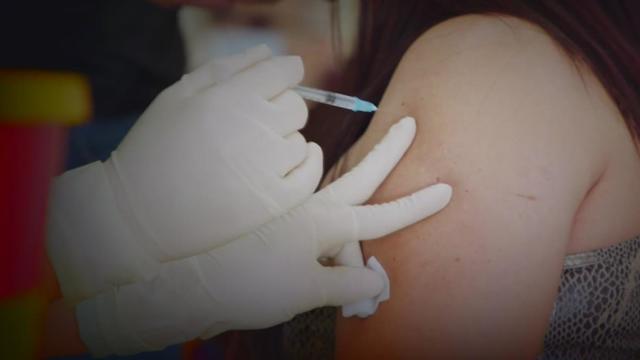 This is a photo of someone getting a COVID-19 vaccination 