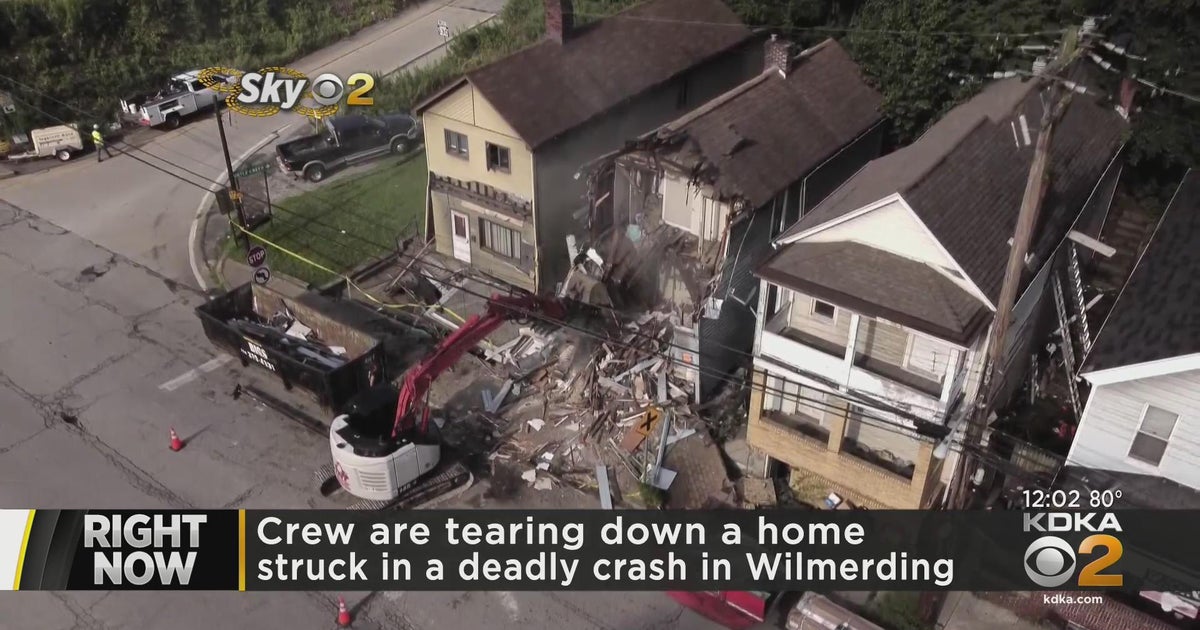 Crews tear down vacant home after deadly garbage truck crash CBS