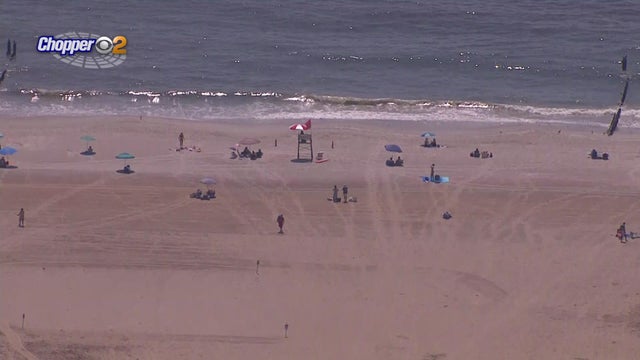 An aerial shot of the beach and the ocean at Jacob Riis Park. 
