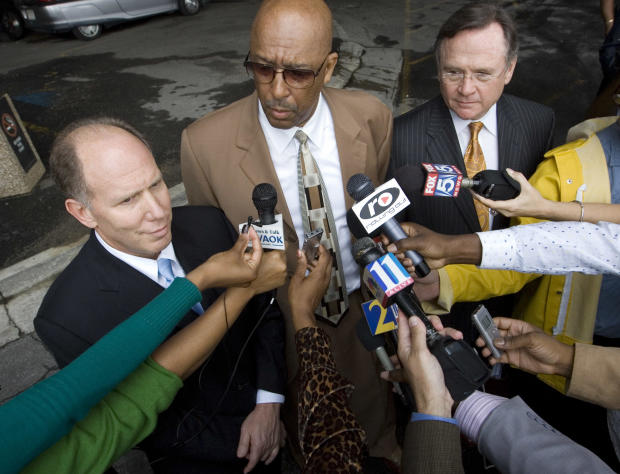 Attorney Dwight Thomas speaks to reporters in a file photo from 2007 
