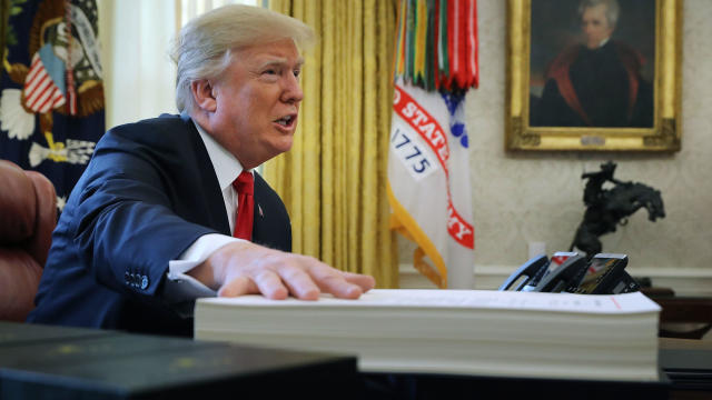 Donald Trump Signs Tax Reform And Jobs Bill Into Law At The White House 