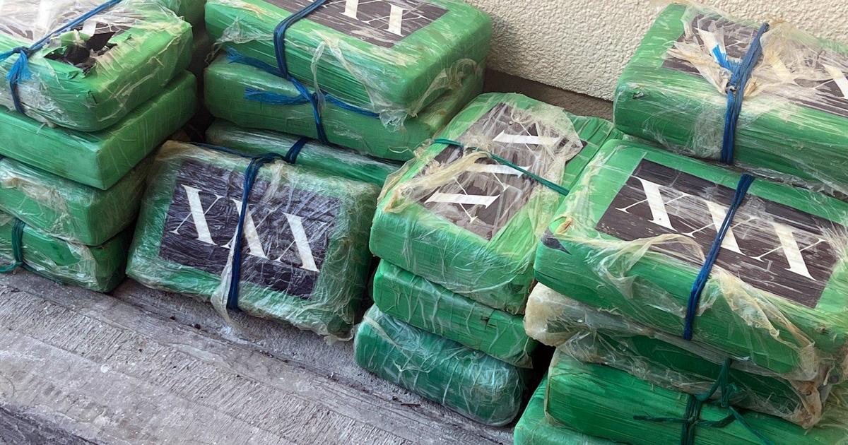 55 pounds of narcotics marked with \