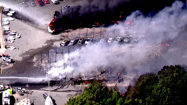 Massive blaze destroys boats, cars in Massachusetts boatyard 