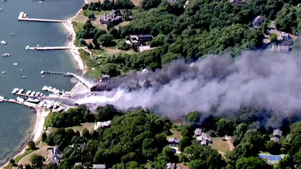 Massive blaze destroys boats, cars in Massachusetts boatyard 