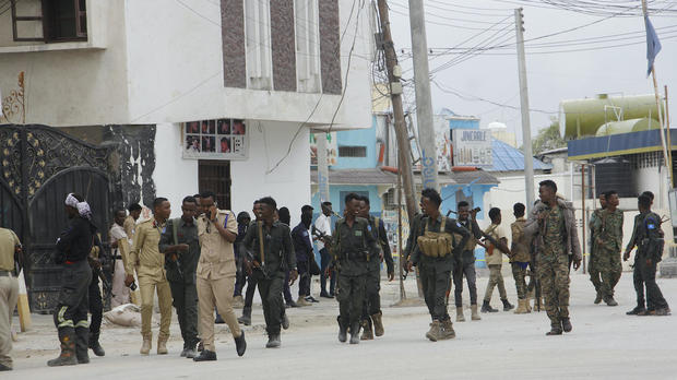 Soldiers patrol outside the Hayat Hotel in Mogadishu, Somalia, Aug, 20, 2022. 