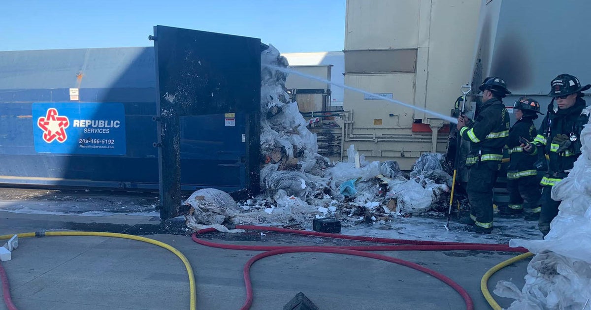 Fire crews knock down flames in cardboard compactor outside Lathrop