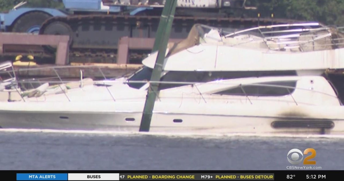 Yacht that caught fire and sank lifted from Hudson River CBS New York