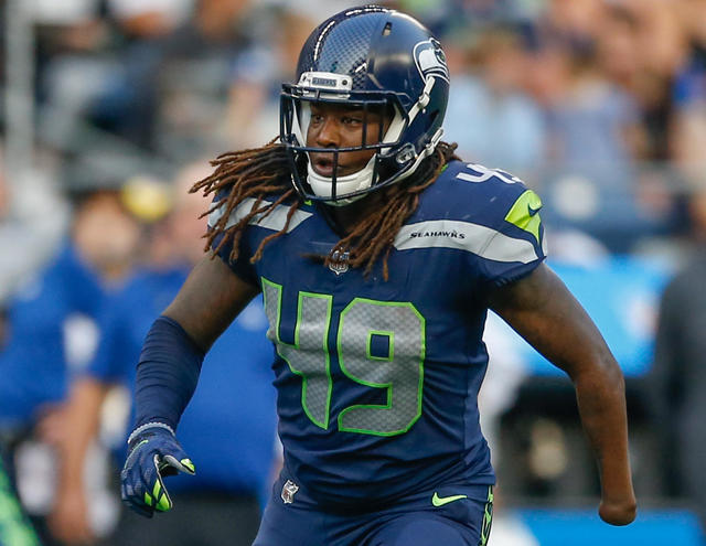 Shaquem Griffin, first one-handed player in NFL history, announces  retirement - CBS News