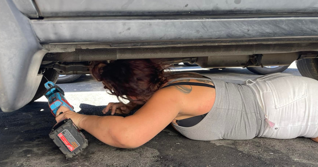 Bystander catches woman allegedly trying to steal catalytic converter from vehicle in Walmart parking lot