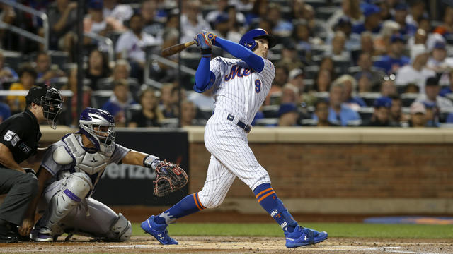Brandon Nimmo #9 of the New York Mets follows through on his first inning home run against the Colorado Rockies at Citi Field on August 27, 2022 in New York City. 