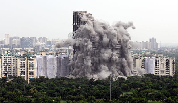 Implosion demolishes twin high-rise buildings on the outskirts of New Delhi, India 