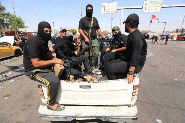 Supporters of Iraq's Shia cleric Muqtada al-Sadr start leaving Baghdad's Green Zone 