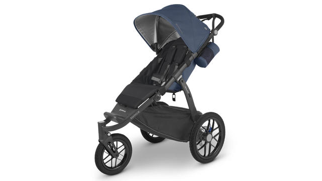 Black and blue three-wheeled stroller 