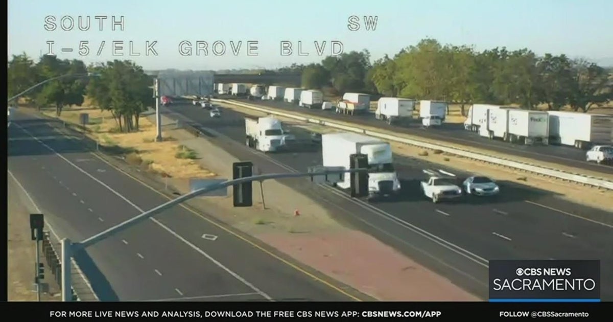 Overturned tomato truck in Elk Grove