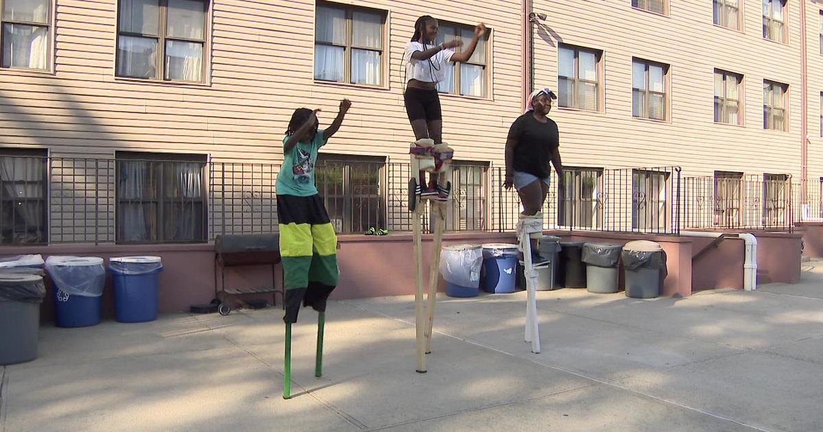 “I feel more powerful”: Young stilt walkers preparing for West Indian American Day Carnival appearances