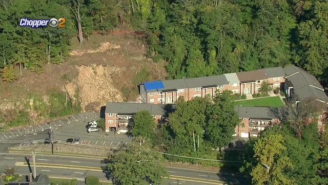 An aerial shot of a West Orange apartment complex at the foot of a slope that has been deemed unstable. 