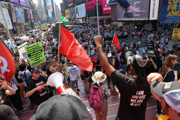 Pro-Union Protestors Rally At NYC Homes Of Jeff Bezos And Howard Schultz 