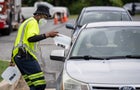 Workers with the Baltimore City Department of Public Works distribute jugs of water to city residents at the Landsdowne Branch of the Baltimore County Library on Sept. 6, 2022, in Baltimore, Maryland. 