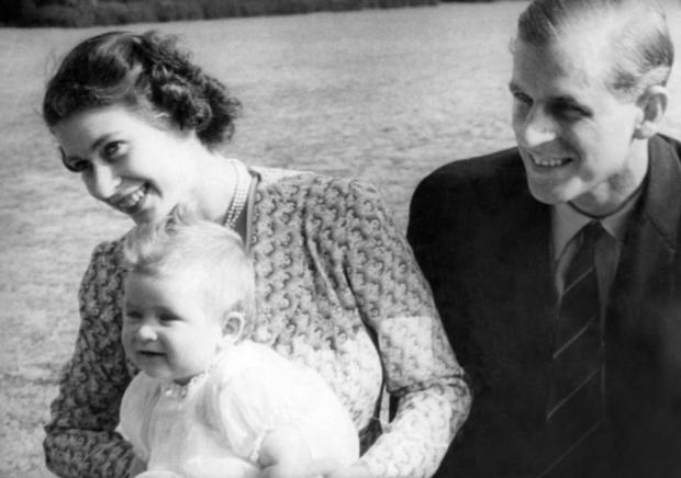 These pictures of eight year old Prince Charles and his Royal parents - Princess Elizabeth and the Duke of Edinburgh - are the most informal ever taken of the baby Prince and his youthful mother and father. These pictures are from a film made for the British Newsreels Association in the grounds of Windlesham Moor, country home in Surrey of Princess Elizabeth and the Duke