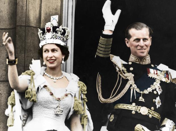 Queen Elizabeth II and the Duke of Edinburgh on the day of their coronation, Buckingham Palace, 1953. (Colorised black and white print)