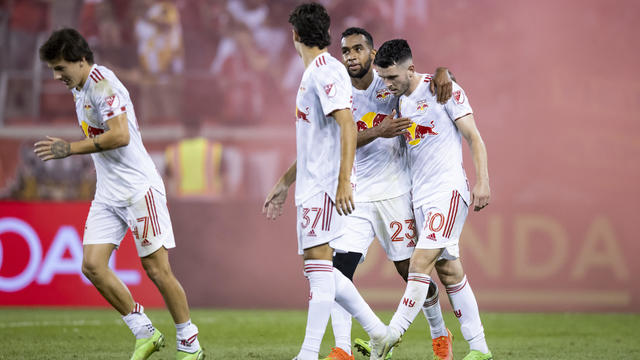 Lewis Morgan #10 of New York Red Bulls celebrates his goal with teammates in the second half of the Major League Soccer match against the New England Revolution at Red Bull Arena on September 10, 2022 in Harrison, New Jersey. 