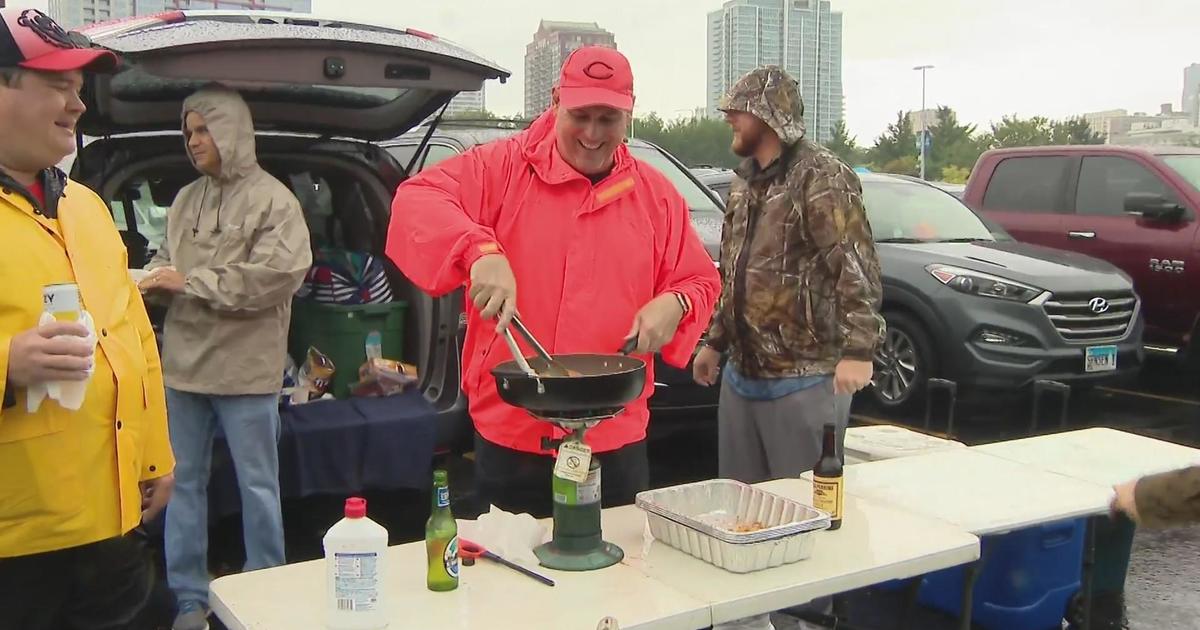 Chicago Bears Fan Struggles With Rain Poncho on Live Television