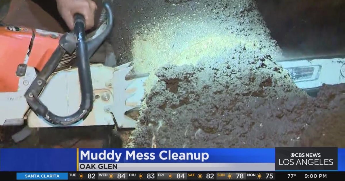Crews cleaning muddy mess left by flooding, mudslides in Oak Glen CBS