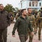 Zelenskyy visits town recently retaken from Russia in bold show of force