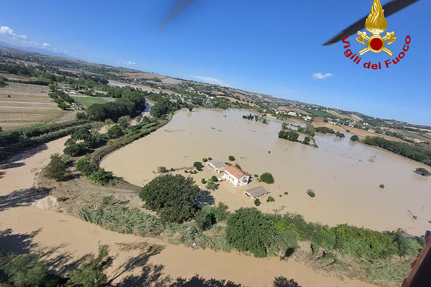 This picture released by Italian firefighters shows an aerial view of the Senigallia area after floods hit the Marche region in central-east Italy, Sept. 16, 2022. 