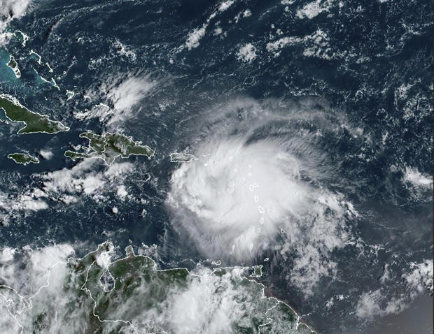 This satellite image provided by NOAA shows Tropical Storm Fiona in the Caribbean on Sept. 17, 2022. 