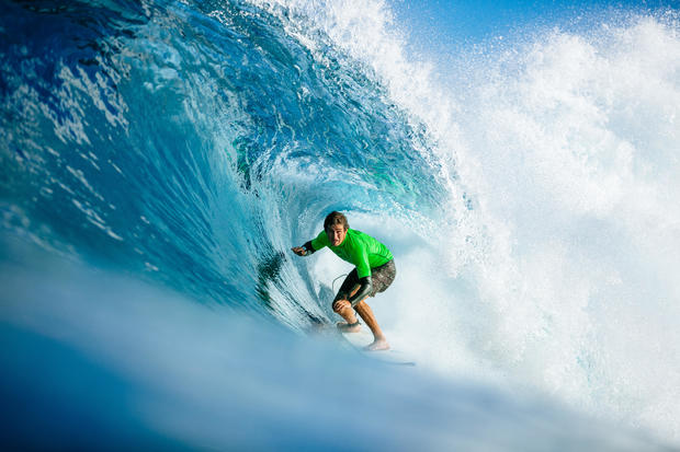 Kalani David of Hawaii advances to the quarterfinals of the Pipe Invitational, the trials of the 2019 Billabong Pipe Masters, after winning Heat 3 of Round 1 at Pipeline on December 9, 2019, in Oahu, Hawaii. 