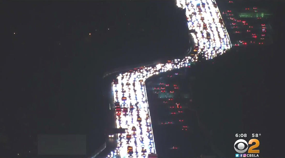 405 Freeway back open after load of wood pallets leaves debris all over ...