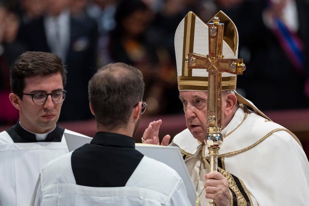 Pope Francis delivers his blessing at the end of the