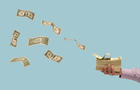 Money flying off stack of bills in man's hand 