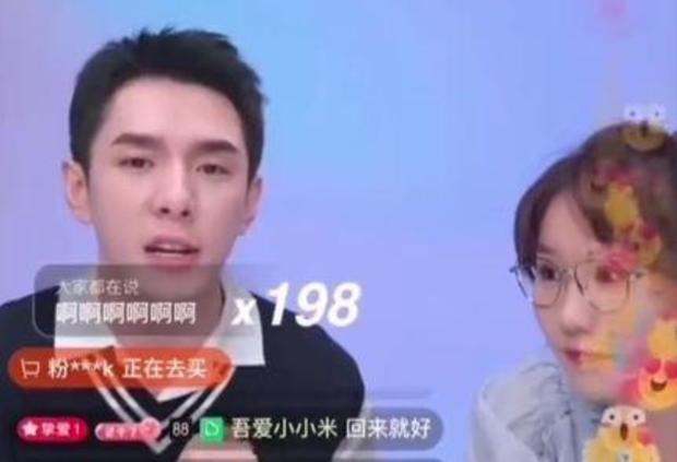 Chinese social media influencer and sales powerhouse Li Jiaqi, left, appears alongside a co-presenter during his first sales session for an Alibaba-owned e-commerce platform since he vanished without explanation more than 100 days earlier