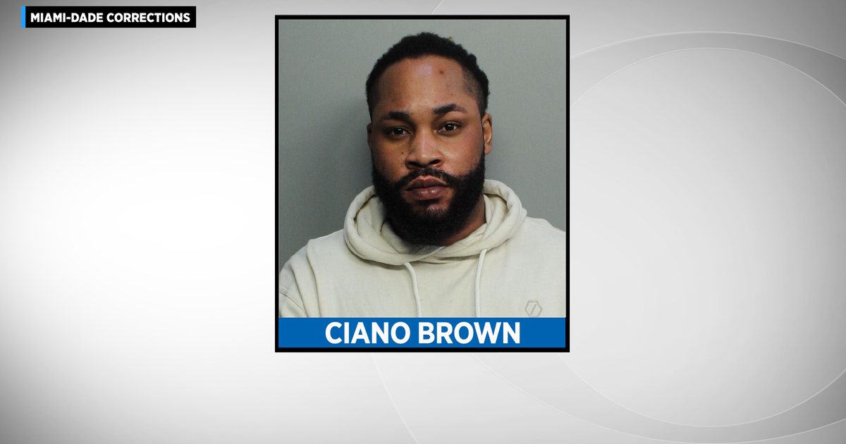Male caught on digital camera positioning cellphone beneath dress of female client arrested