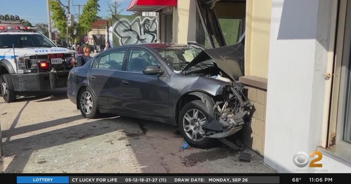 Car crashes into KFC in Queens during attempted carjacking