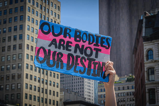 "Our bodies are not our destiny" sign 