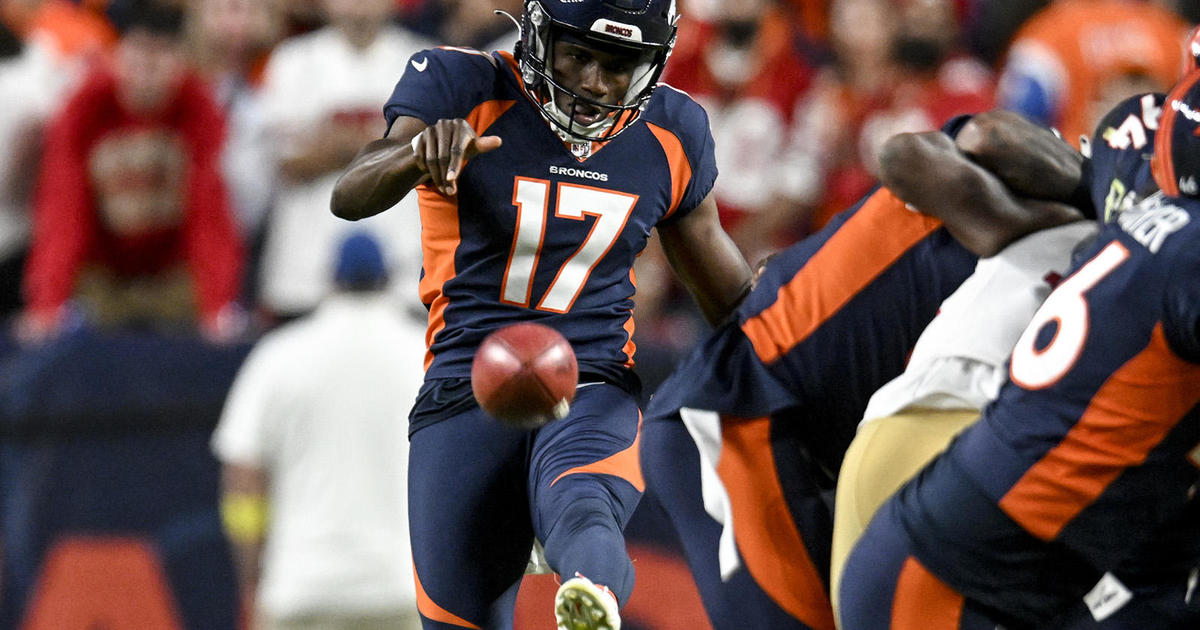 Denver Broncos punter Corliss Waitman warms up before a preseason