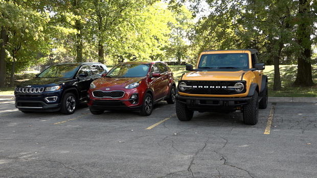 Three parked vehicles that are rented on the Turo app 