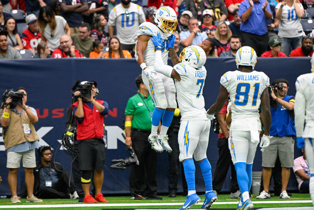 October 2, 2022: Los Angeles Chargers running back Austin Ekeler (30) runs  for a touchdown after making a catch during the 4th quarter of an NFL  football game between the Los Angeles