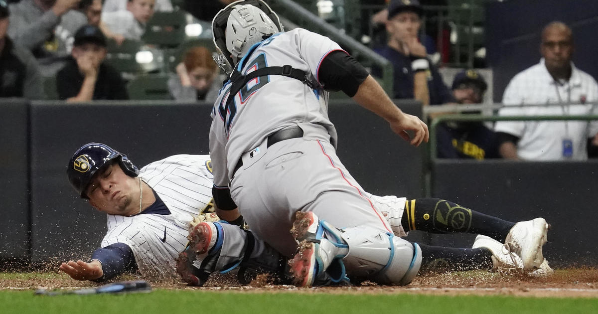 Marlins win in 12, placing Brewers’ playoff hopes on ropes