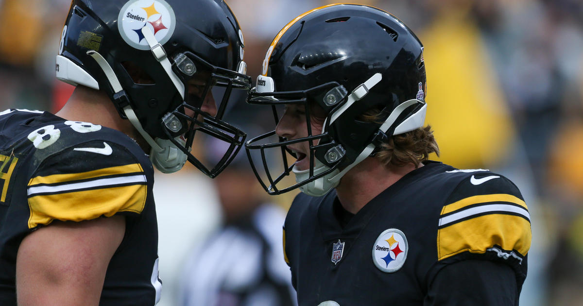 Kenny Pickett of the Pittsburgh Steelers celebrates after scoring a