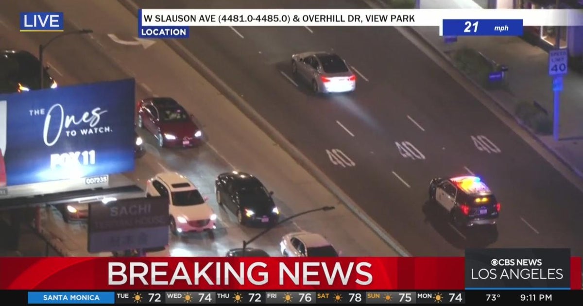 Police in pursuit of a suspect wanted for assault with a deadly weapon ...