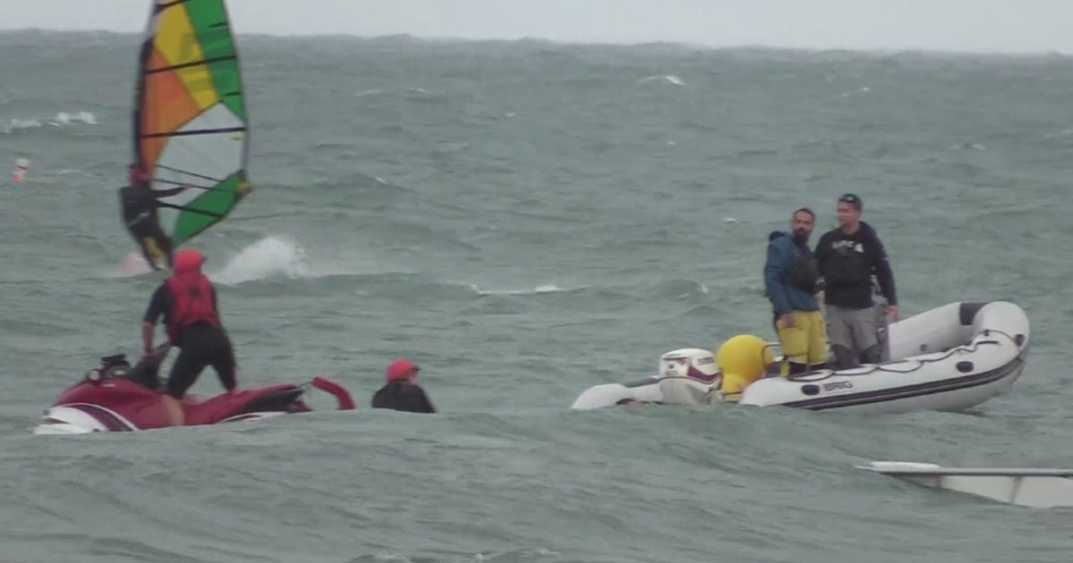 Reports Multiple people rescued after boat capsizes on Lake Michigan