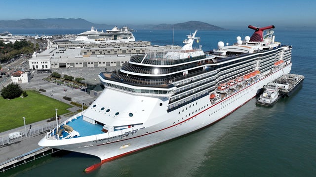 Top view of cruise ship at dock 