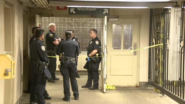 Police officers stand inside the 176th Street and Jerome Avenue subway station in the Bronx. 