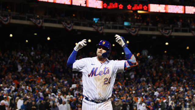 Pete Alonso #20 of the New York Mets celebrates after hitting a home run in the fifth inning during the Wild Card Series game between the San Diego Padres and the New York Mets at Citi Field on Saturday, October 8, 2022 in New York, New York. 
