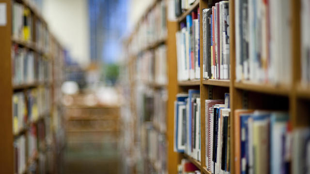 Books on shelf in library 